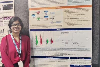 UBC Science Co-op Cognitive Systems student Rithika Nair stands with her research at the research conference hosted by the Centre for Heart Lung Innovation (HLI).